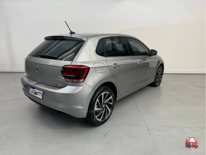 VOLKSWAGEN - POLO - 2021/2021 - Dourada - R$ 87.900,00